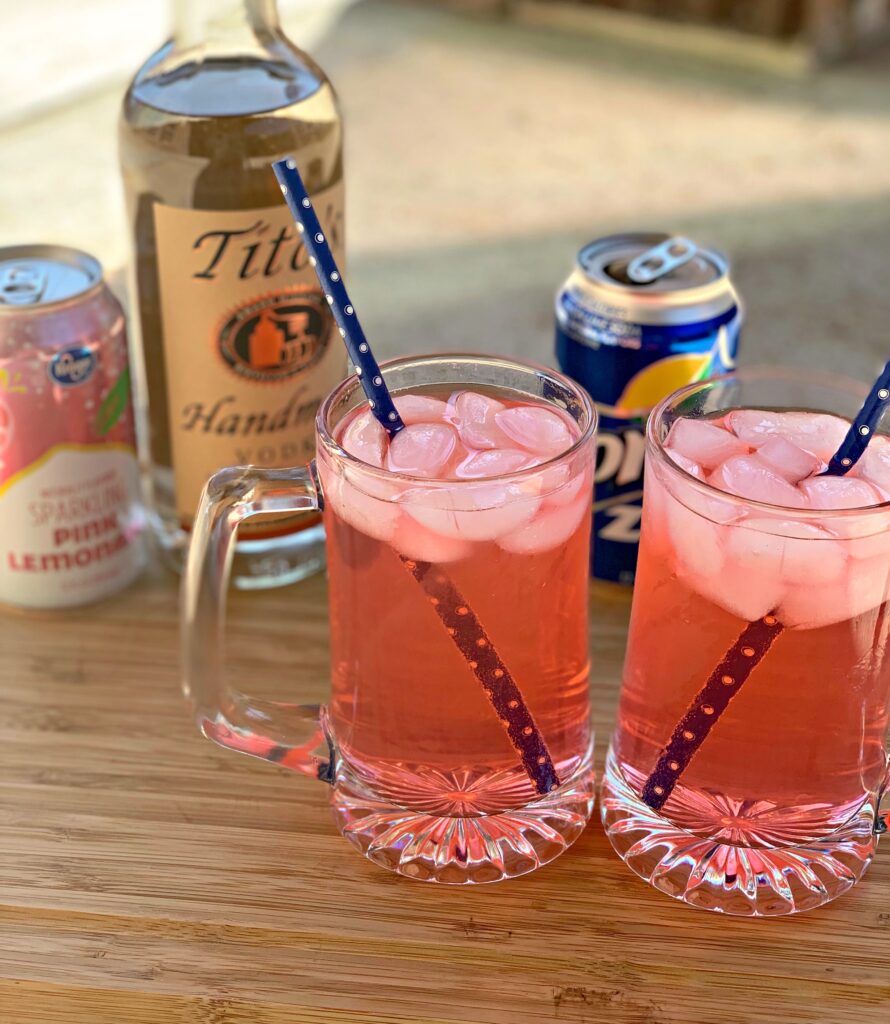 a pink cocktail combining sprite, vodka, and pink lemonade