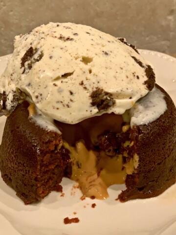 chocolate peanut butter lava cakes with ice cream scooped on top