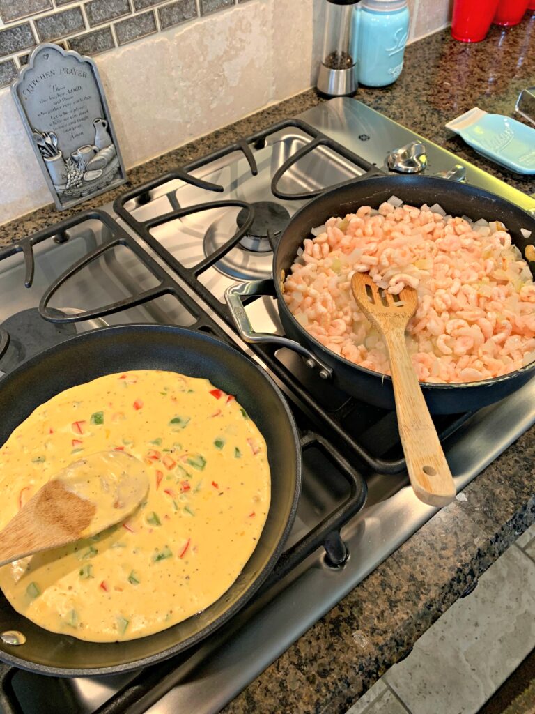Shrimp and cheese sauce on the stove