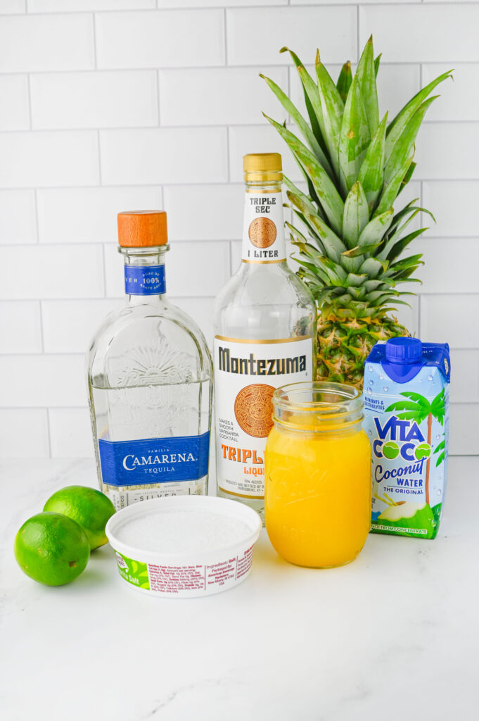 ingredients needed to make tropical margaritas.