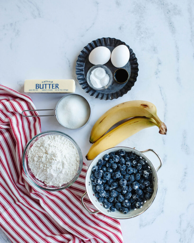 all the ingredients needed to make Blueberry Banana Bread.