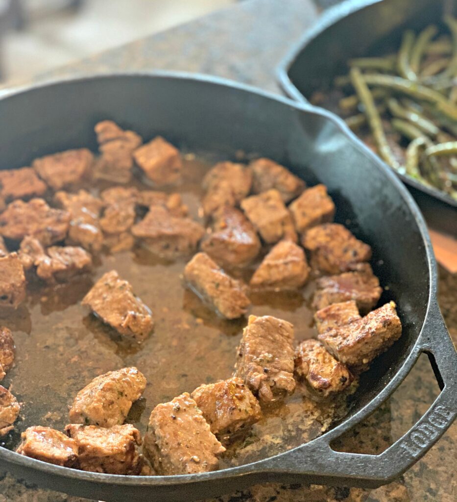 flavorful steak bites cooked in a cast iron skillet