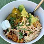 flavorful chicken and rice made in the instant pot and served with your favorite toppings
