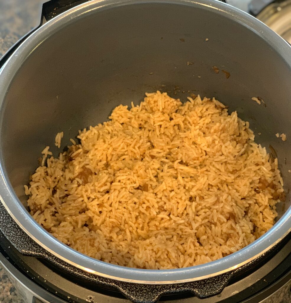 using the instant pot, this rice is packed with flavor and onions throughout
