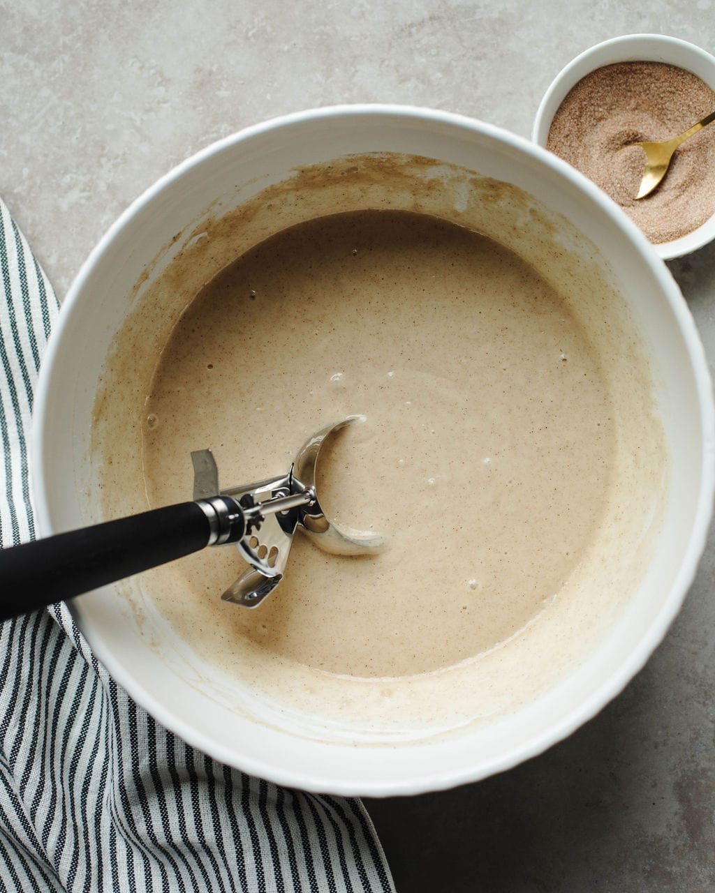 wet ingredients combined in a mixing bowl for sweet muffins.