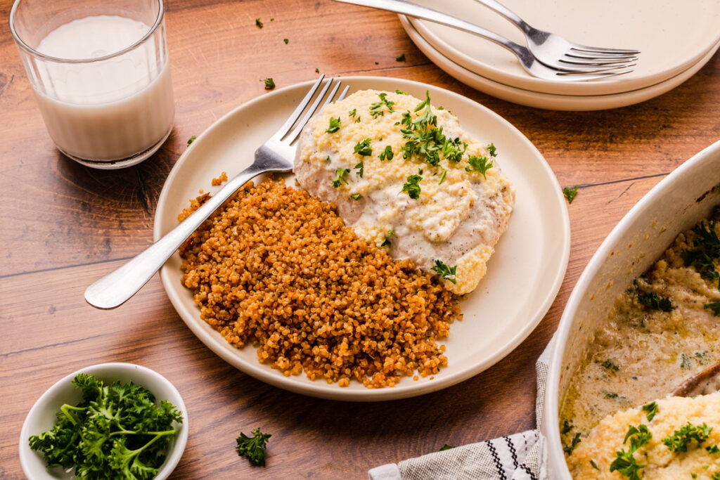 a plate of cooked quinoa and chicken