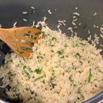 cilantro and lime throughout fluffy white rice