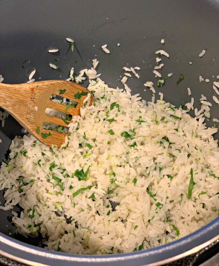 fluffy white rice with lime and cilantro throughout