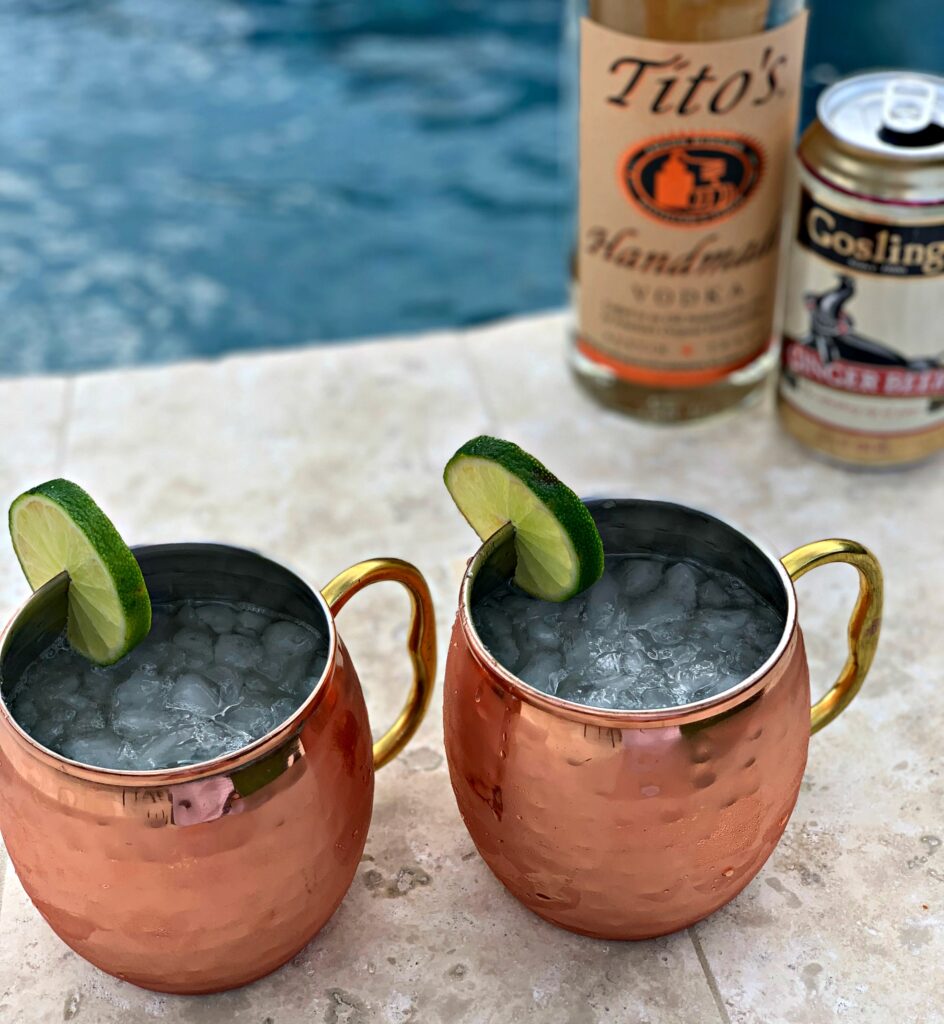 a classic cocktail including ginger beer, lime, and vodka