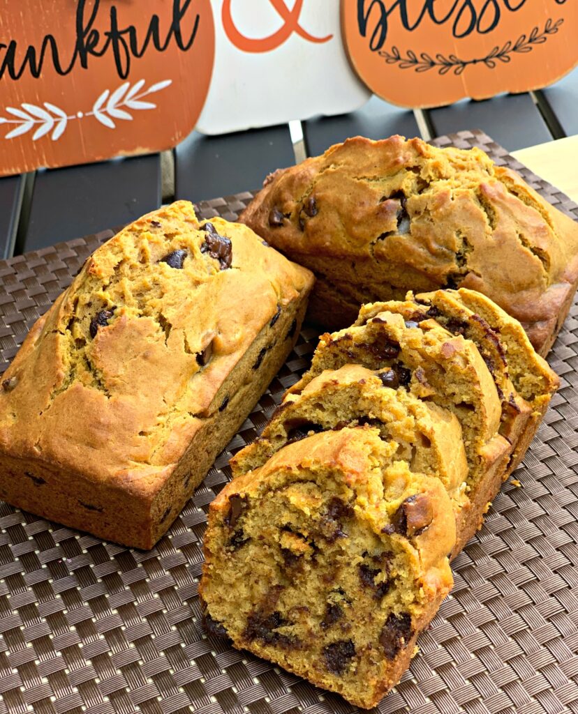 slices of warm, pumpkin banana bread with chocolate chips throughout