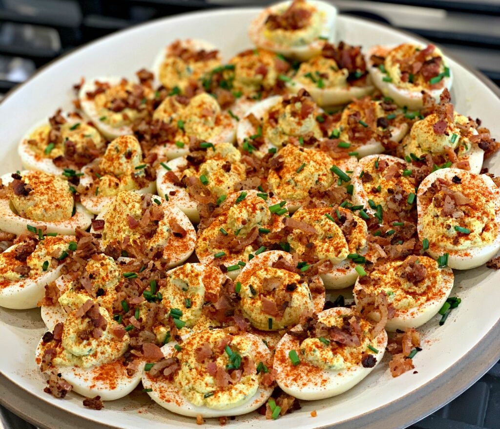 deviled eggs smoked on the smoker and topped with a filling and bacon