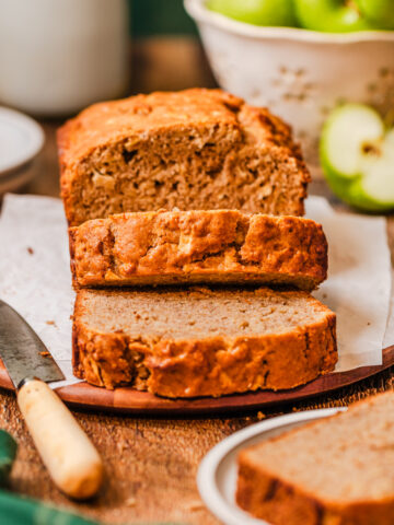 an up close look at apple quick bread on a serving platter.