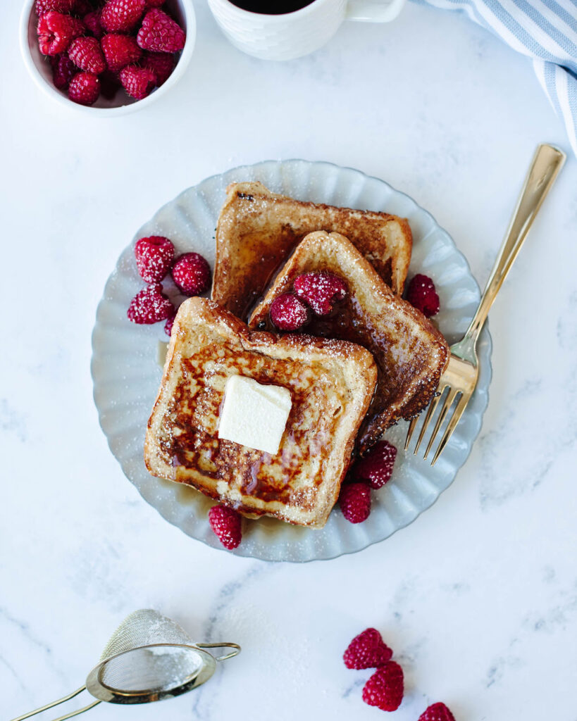 fresh fruit on top of cinnamon coated bread that has been toasted.