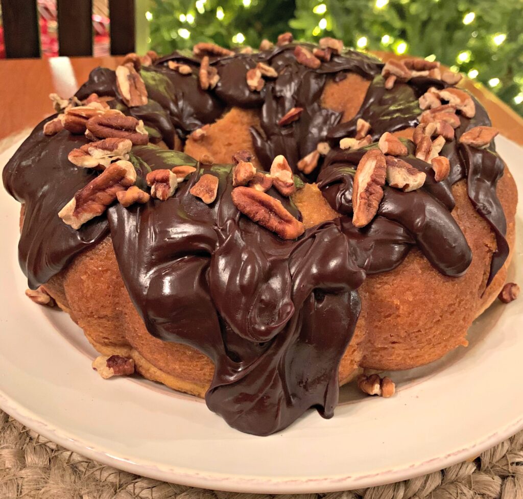 moist yellow cake with a rum glaze and chocolate frosting