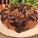 bacardi rum glaze over a moist, yellow cake and topped with chocolate frosting