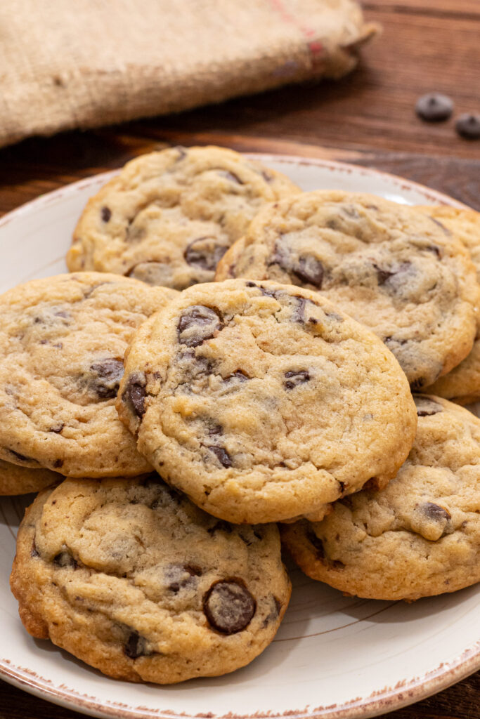 a batch of chocolate chip cookies on a plate