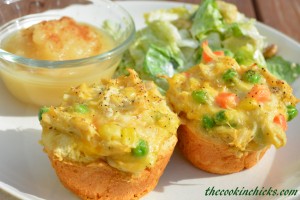 chicken pot pie muffins using a biscuit as the bottom of the muffin cup