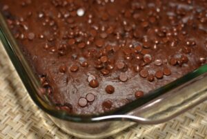 chocolate dump cake made using chocolate pudding mix and chocolate chips