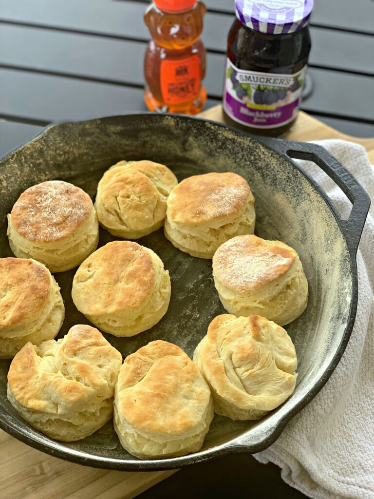 cast iron biscuits with honey and jam on the side