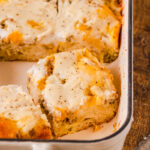 an up close view of biscuits and gravy breakfast casserole