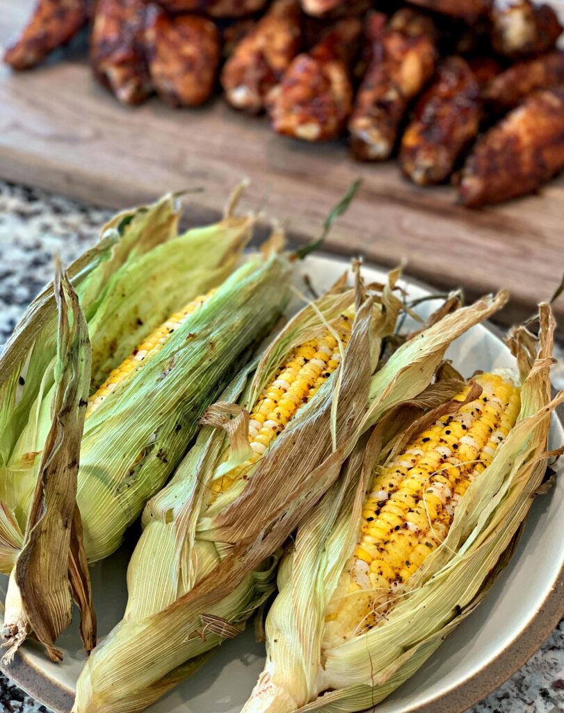 Tender sweet corn cooked on the smoker