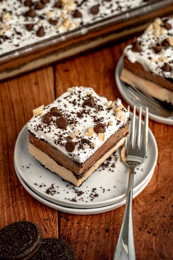 layers of peanut butter, chocolate, and oreo combined