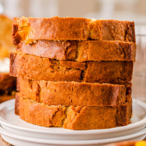 sliced pieces of peach bread on a plate