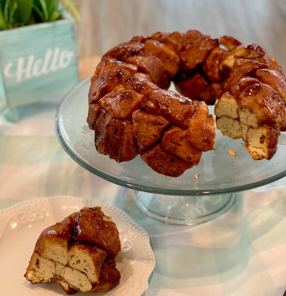Warm and chewy slice of monkey bread ready to eat