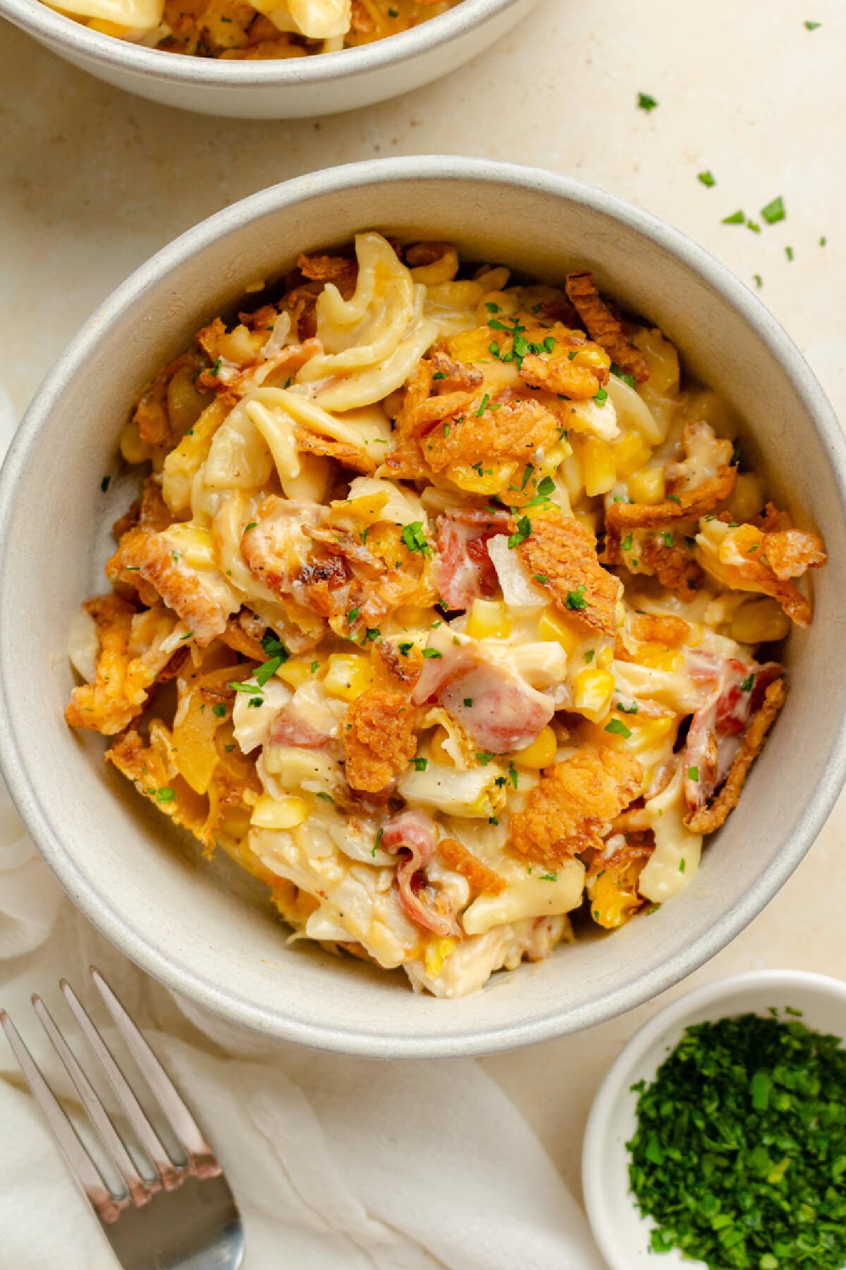 A bowl of cheesy chicken casserole served and ready to enjoy.
