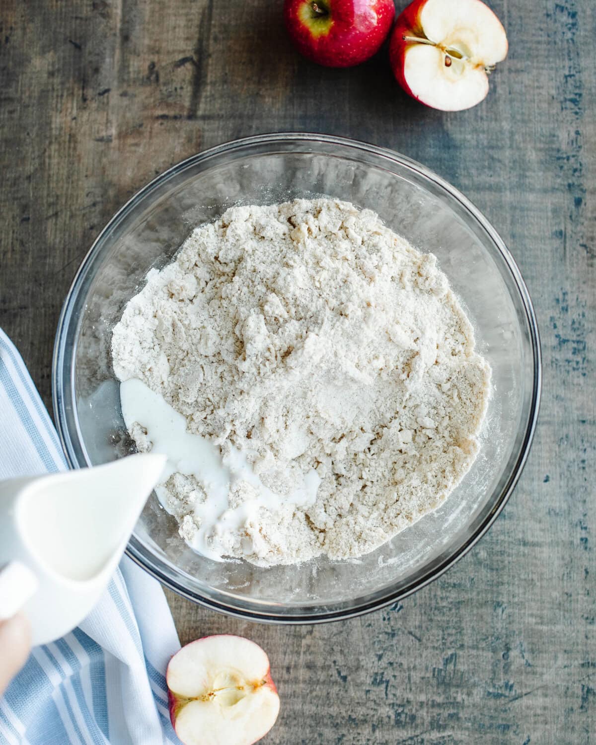 buttermilk poured into dry ingredients to make biscuits.