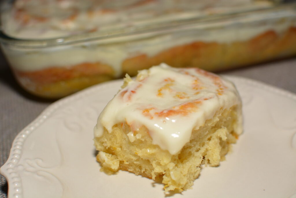 an orange roll served on a plate