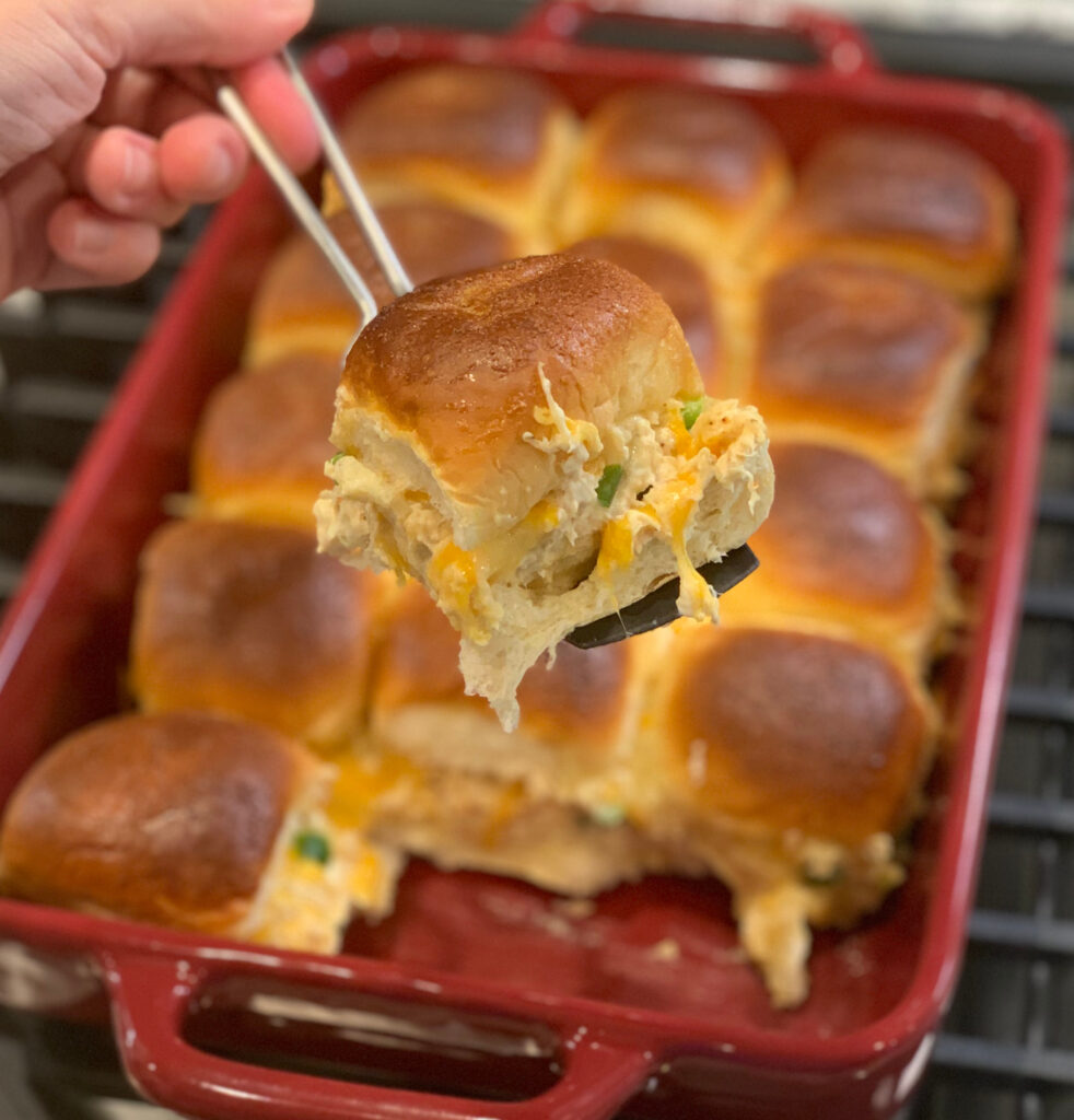 Hawaiian sweet rolls, shredded chicken, melted cheese, and jalapenos combine into these tasty sliders
