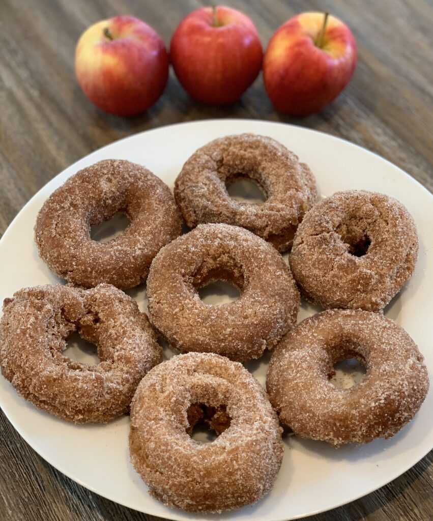 tender fried apple cider donuts coated in sugar