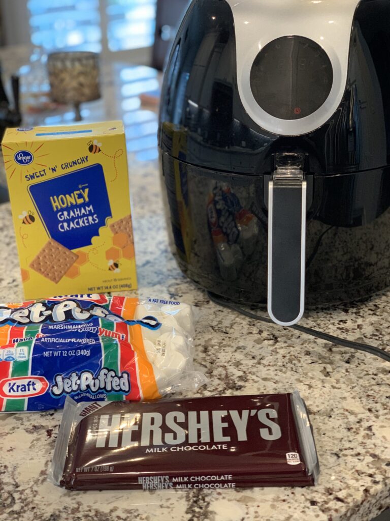 all the ingredients needed for a s'more in your air fryer
