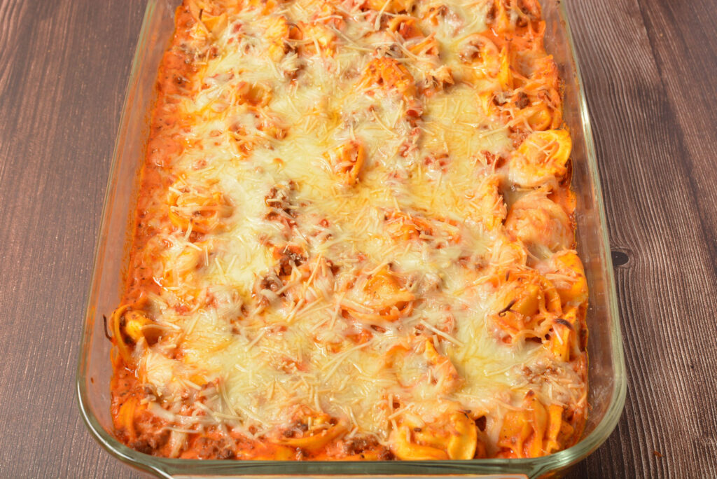 ground beef, pasta sauce, and cream cheese over tender cheese tortellini