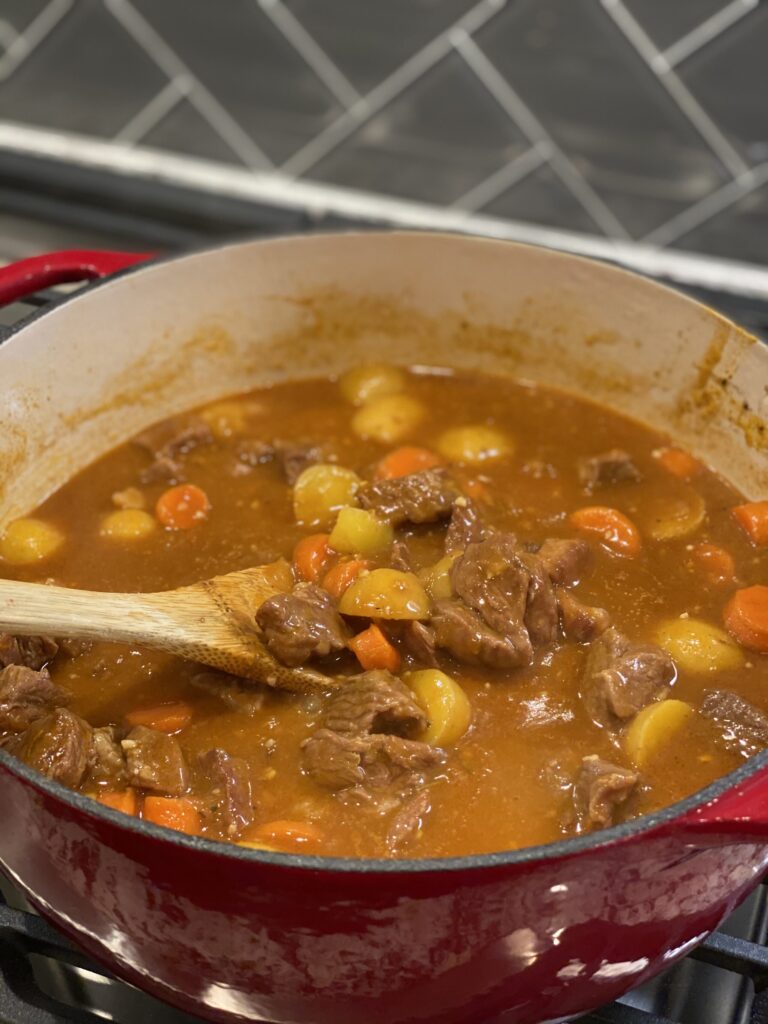 flavorful beef stew cooked in a Dutch oven