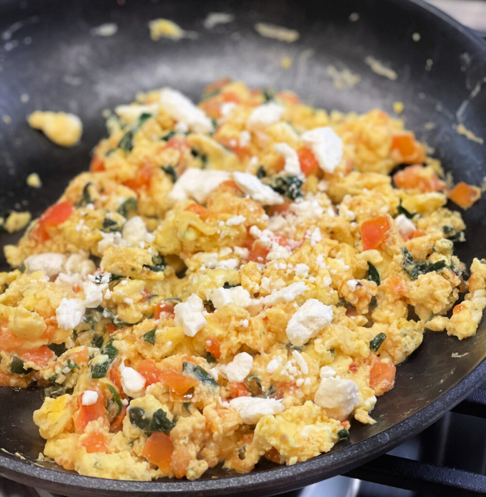 cheesy egg scramble packed with veggies 