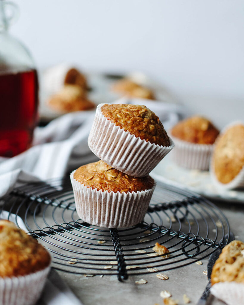 a stack of maple sugar oat muffins.