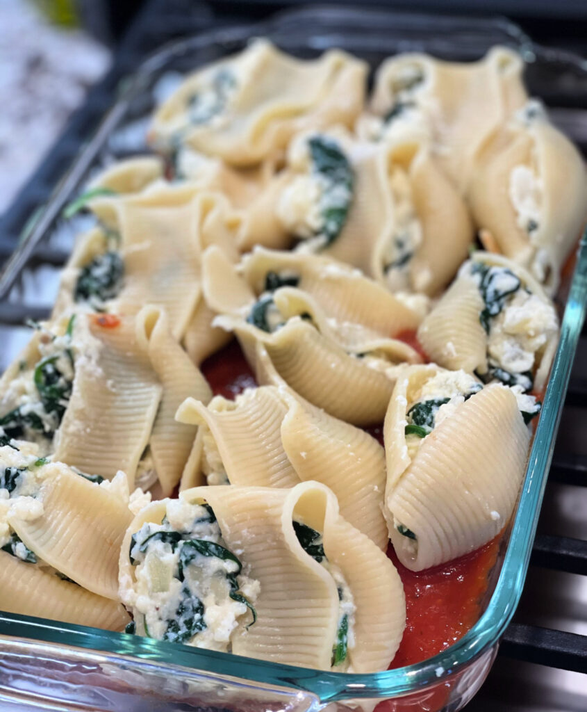 Cheesy Spinach Stuffed Shells - Peas and Crayons