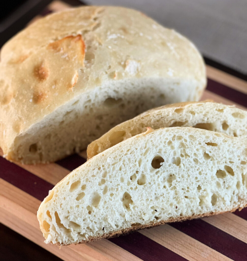 sliced crusty bread that is tender on the inside with a crisp crust