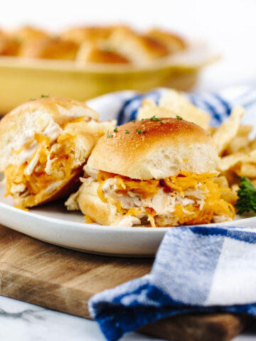 tender chicken with bacon and cheese in a Hawaiian roll.