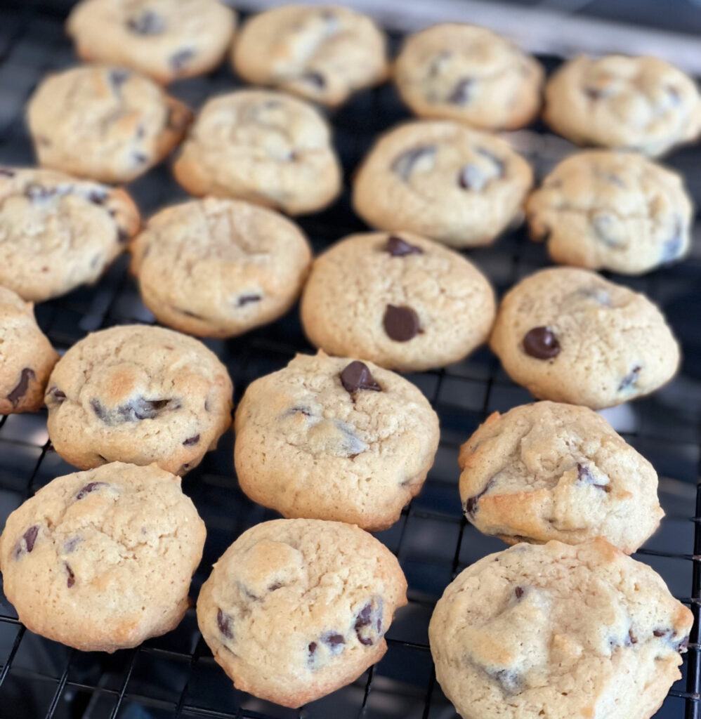 fluffy chocolate chip cookies with bits of cow tale candy throughout