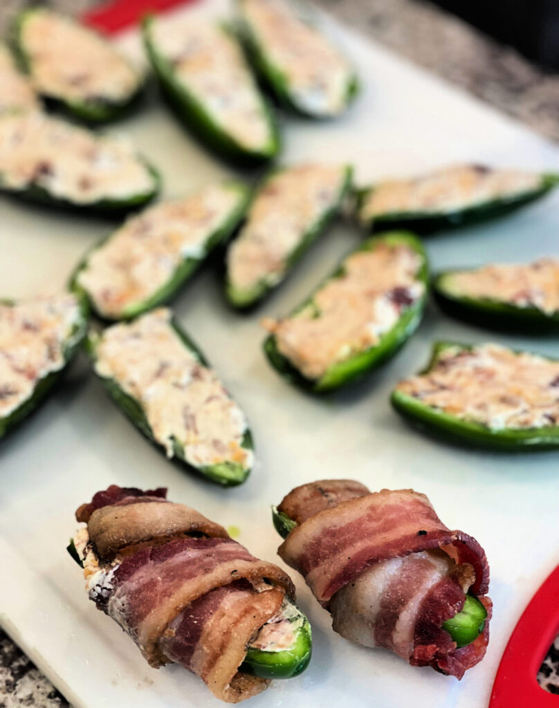 texas twinkies are bacon wrapped stuffed jalapenos with brisket, cream cheese, and seasoning