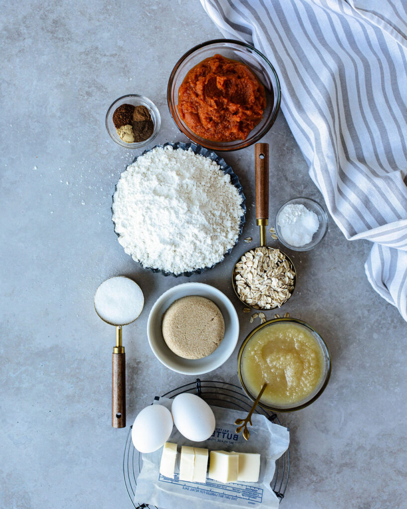all the ingredients needed to make a pumpkin Fall muffin.