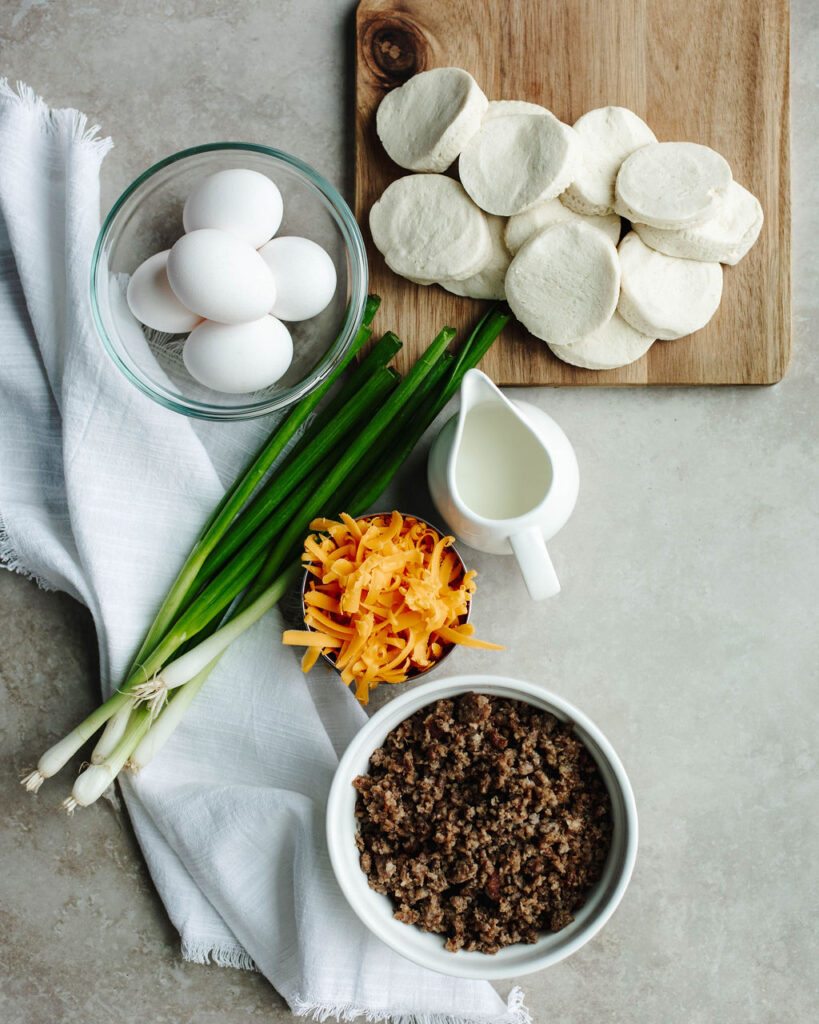 all the ingredients needed to make biscuit breakfast casserole.