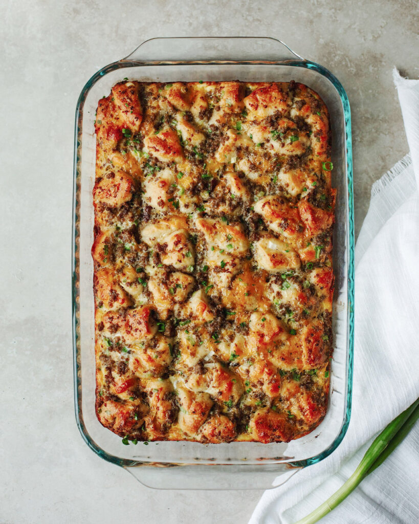 a baked biscuit breakfast casserole ready to serve.