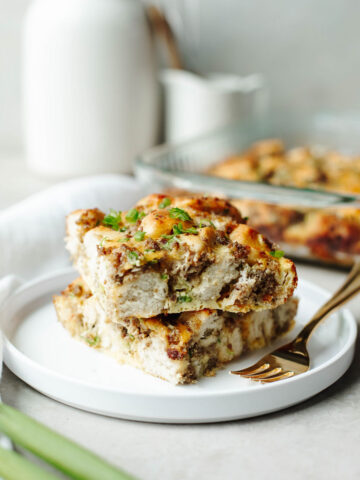 cooked pieces of frozen biscuit breakfast bake on a white plate.