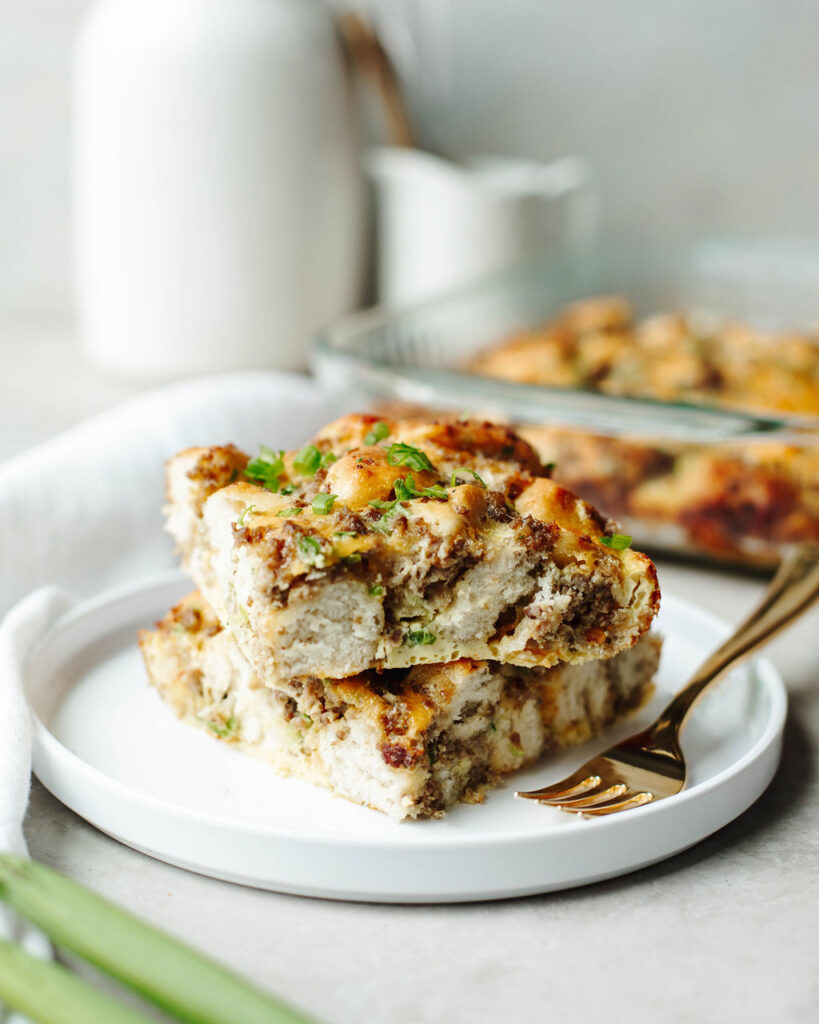 cooked pieces of frozen biscuit breakfast bake on a white plate.