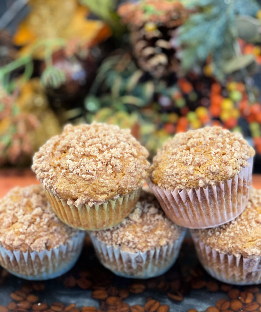 Fluffy, moist pumpkin muffins with a crumbled cinnamon streusel on top