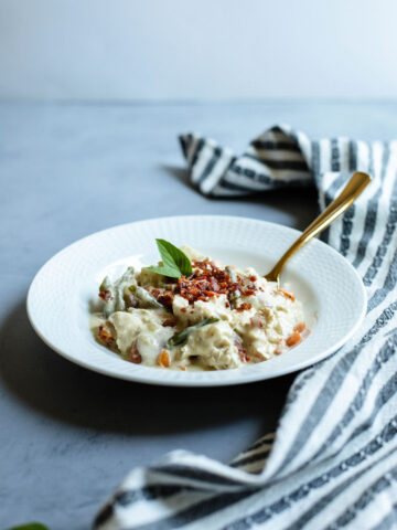 a creamy, hearty stew made with chicken and fresh ingredients.